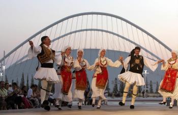 <a href="https://www.theepochtimes.com/assets/uploads/2015/07/horo-greece-53303919_medium.jpg"><img src="https://www.theepochtimes.com/assets/uploads/2015/07/horo-greece-53303919_medium.jpg" alt="ATHENS, GREECE: A Greek folk-dance group performs the horo in front of the Olympic Velodrome at the Olympic Complex in Athens during the Games of 2005. (Louisa Gouliamaki/AFP/Getty Images)" title="ATHENS, GREECE: A Greek folk-dance group performs the horo in front of the Olympic Velodrome at the Olympic Complex in Athens during the Games of 2005. (Louisa Gouliamaki/AFP/Getty Images)" width="320" class="size-medium wp-image-89099"/></a>