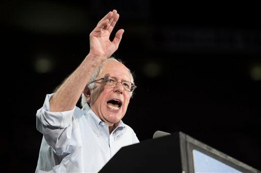 Democratic presidential candidate Sen. Bernie Sanders, I-Vt., speaks at a rally, Sunday, Aug. 9, 2015, at the Moda Center in Portland, Ore. (AP Photo/Troy Wayrynen)