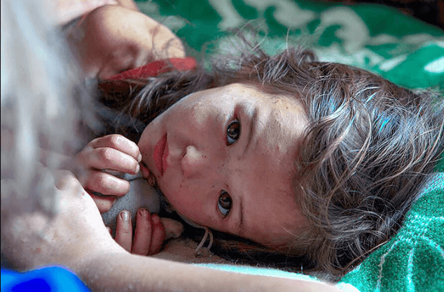 Karina recovering after being found. (Sakha Republic Rescue Service)