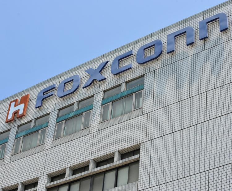 <a><img src="https://www.theepochtimes.com/assets/uploads/2015/09/101682165fox.jpg" alt="Picture shows Taiwanese electronics giant Hon Hai's headquarters in Tuchung city, northern Taiwan on June 7, 2010. (Patrick Lin/AFP/Getty Images)" title="Picture shows Taiwanese electronics giant Hon Hai's headquarters in Tuchung city, northern Taiwan on June 7, 2010. (Patrick Lin/AFP/Getty Images)" width="320" class="size-medium wp-image-1818878"/></a>