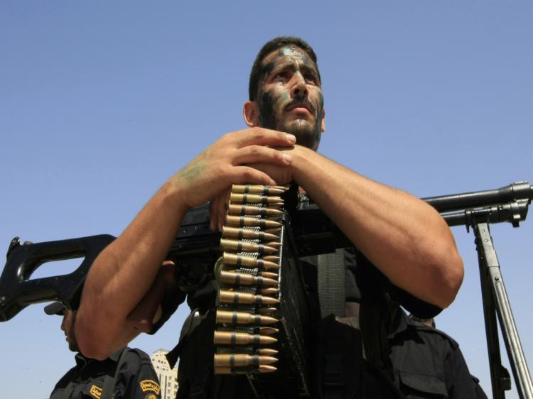 <a><img src="https://www.theepochtimes.com/assets/uploads/2015/09/102172021-Gaza_strip.jpg" alt="Members of Hamas' security forces demonstrate their skills during a graduation ceremony in Gaza City on June 17, 2010. The Islamic Resistance Movement, known as Hamas, won Palestinian legislative elections in 2006 and violently seized power in Gaza the following year. (Mohammed Abed/AFP/Getty Images)" title="Members of Hamas' security forces demonstrate their skills during a graduation ceremony in Gaza City on June 17, 2010. The Islamic Resistance Movement, known as Hamas, won Palestinian legislative elections in 2006 and violently seized power in Gaza the following year. (Mohammed Abed/AFP/Getty Images)" width="320" class="size-medium wp-image-1818485"/></a>