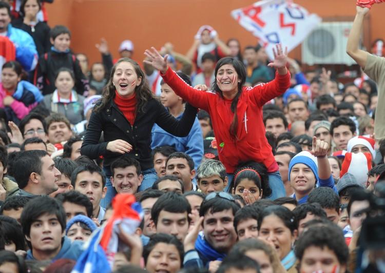 <a><img class="size-large wp-image-1773255" src="https://www.theepochtimes.com/assets/uploads/2015/09/102524160-3.jpg" alt="Paraguayan soccer fans celebrate after Paraguay defeated Japan in the FIFA World Cup 2010 round of 16 match, in downtown Asuncion, in 2010. (Norberto DuarteAFP/Getty Images)" width="590" height="419"/></a>