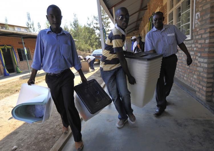 <a><img src="https://www.theepochtimes.com/assets/uploads/2015/09/103290072.jpg" alt="Rwanda electoral agents carry ballot boxes to Kakiro polling station in Kigali, on the eve of the country's presidential election, on August 8, in Kigali. (Simon Maina/Getty Images)" title="Rwanda electoral agents carry ballot boxes to Kakiro polling station in Kigali, on the eve of the country's presidential election, on August 8, in Kigali. (Simon Maina/Getty Images)" width="320" class="size-medium wp-image-1816427"/></a>