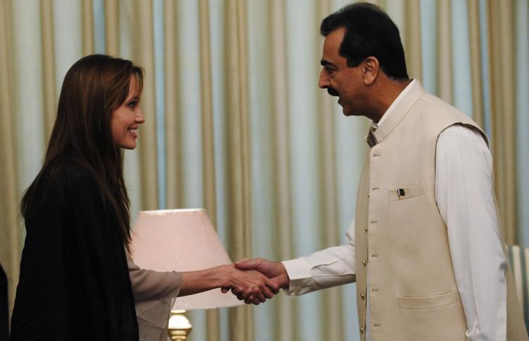 <a><img src="https://www.theepochtimes.com/assets/uploads/2015/09/103911491.jpg" alt="US actress and UNHCR Goodwill Ambassador Angelina Jolie shakes hands with Pakistani Prime Minister Yousaf Raza Gillani in Islamabad on September 8. Jolie visited Pakistan's northwest September 7 to draw the world's attention towards the plight of 21 million people affected by the country's worst-ever floods. (Farooq Naeem/Getty Images)" title="US actress and UNHCR Goodwill Ambassador Angelina Jolie shakes hands with Pakistani Prime Minister Yousaf Raza Gillani in Islamabad on September 8. Jolie visited Pakistan's northwest September 7 to draw the world's attention towards the plight of 21 million people affected by the country's worst-ever floods. (Farooq Naeem/Getty Images)" width="320" class="size-medium wp-image-1815010"/></a>