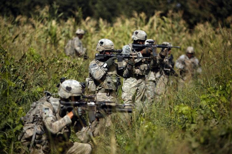 <a><img src="https://www.theepochtimes.com/assets/uploads/2015/09/103963012troops.jpg" alt="US soldiers with the 101st Airborne Division Alpha Battery 1-320th during a patrol on the outskirts of the town of Jellawar in The Arghandab Valley on September 10, 2010. (Patrick Baz/AFP/Getty Images)" title="US soldiers with the 101st Airborne Division Alpha Battery 1-320th during a patrol on the outskirts of the town of Jellawar in The Arghandab Valley on September 10, 2010. (Patrick Baz/AFP/Getty Images)" width="320" class="size-medium wp-image-1814376"/></a>