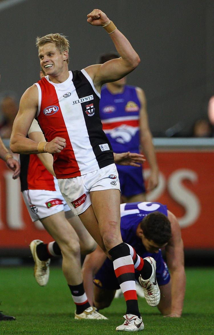 <a><img src="https://www.theepochtimes.com/assets/uploads/2015/09/104238884.jpg" alt="Nick Riewoldt of the Saints celebrates kicking a goal during the Seecond AFL Preliminary Final match between the St Kilda Saints and the Western Bulldogs at Melbourne Cricket Ground on Sept. 18 in Melbourne. (Quinn Rooney/Getty Images)" title="Nick Riewoldt of the Saints celebrates kicking a goal during the Seecond AFL Preliminary Final match between the St Kilda Saints and the Western Bulldogs at Melbourne Cricket Ground on Sept. 18 in Melbourne. (Quinn Rooney/Getty Images)" width="320" class="size-medium wp-image-1814578"/></a>