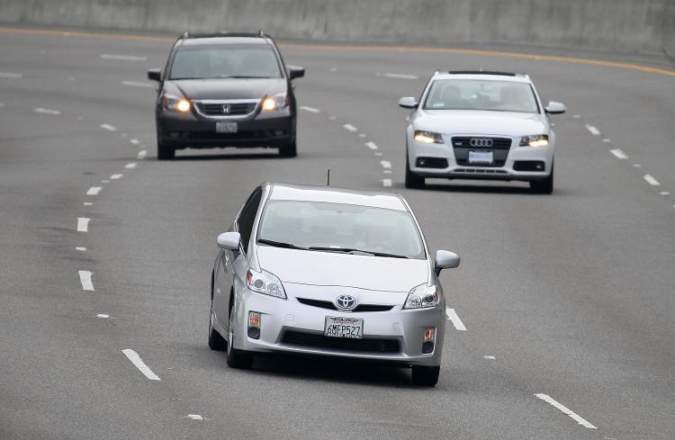 <a><img src="https://www.theepochtimes.com/assets/uploads/2015/09/107214711.jpg" alt="A Toyota Prius (C) drives along highway 101 on November 30, 2010 in Sausalito, California. The NHTSA found that acceleration issues in Toyota cars that prompted a slew of recalls for the Japanese automaker were not due to electronic flaws. (Justin Sullivan/Getty Images)" title="A Toyota Prius (C) drives along highway 101 on November 30, 2010 in Sausalito, California. The NHTSA found that acceleration issues in Toyota cars that prompted a slew of recalls for the Japanese automaker were not due to electronic flaws. (Justin Sullivan/Getty Images)" width="320" class="size-medium wp-image-1808620"/></a>