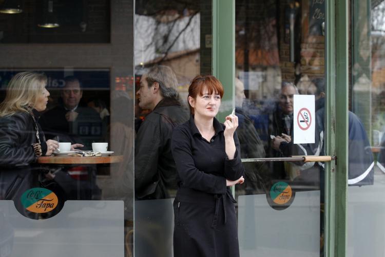 <a><img src="https://www.theepochtimes.com/assets/uploads/2015/09/107845599.jpg" alt="A woman smokes a cigarette outside a cafe in Burgos, Spain on January 2, following the introduction of a new law today banning smoking in all bars, restaurants and public places. (Cesar Manso/Getty Images )" title="A woman smokes a cigarette outside a cafe in Burgos, Spain on January 2, following the introduction of a new law today banning smoking in all bars, restaurants and public places. (Cesar Manso/Getty Images )" width="320" class="size-medium wp-image-1810202"/></a>