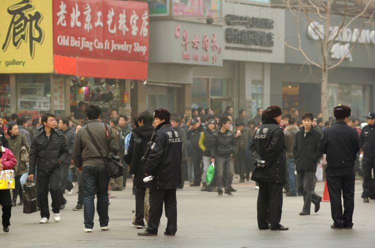 <a><img src="https://www.theepochtimes.com/assets/uploads/2015/09/109309791.jpg" alt="Police keep watch along the Wanfujing shopping street in Beijing after protesters gathered on February 20, 2011. A website claiming to represent China's homegrown Jasmine Revolution has called on the populace to take to the streets, every Saturday at 6:00pm. (Peter Parks/Getty Images)" title="Police keep watch along the Wanfujing shopping street in Beijing after protesters gathered on February 20, 2011. A website claiming to represent China's homegrown Jasmine Revolution has called on the populace to take to the streets, every Saturday at 6:00pm. (Peter Parks/Getty Images)" width="320" class="size-medium wp-image-1807417"/></a>