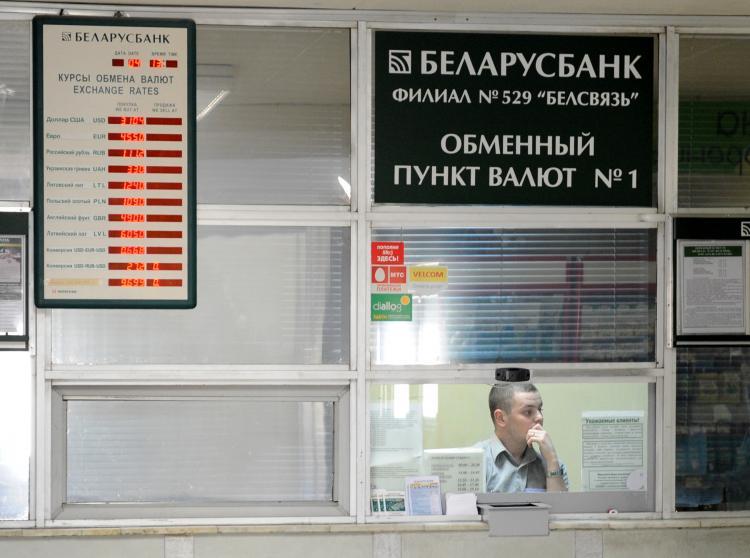 <a><img src="https://www.theepochtimes.com/assets/uploads/2015/09/113206411-banker.jpg" alt="A bank worker sits inside an exchange office in Minsk, on April 27, 2011. Belarus has struggled through a deepening fiscal crisis which began last year when Russia raised the price it charges for energy. (Viktor Drachew/Getty Images)" title="A bank worker sits inside an exchange office in Minsk, on April 27, 2011. Belarus has struggled through a deepening fiscal crisis which began last year when Russia raised the price it charges for energy. (Viktor Drachew/Getty Images)" width="320" class="size-medium wp-image-1804850"/></a>
