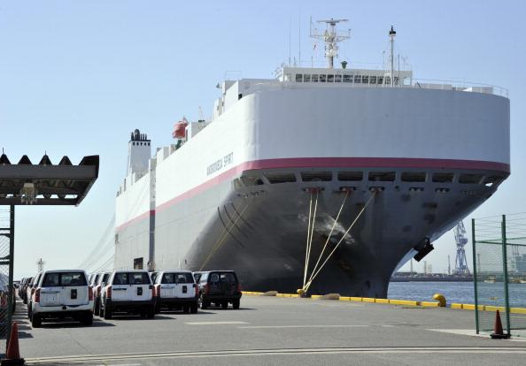 Vehicles of Japan's auto giant Nissan are ready to ship abroad at the Honmoku wharf facility, in Yokohama, Japan in this file photo. Japanese exports rose in January of 2013 compared to a year earlier. (Yoshikazu Tsuno/AFP/Getty Images)