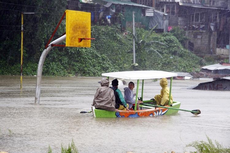 <a><img class="size-large wp-image-1783244" title="Residents affected by floodings, ride on" src="https://www.theepochtimes.com/assets/uploads/2015/09/150301599.jpg" alt="" width="590" height="393"/></a>