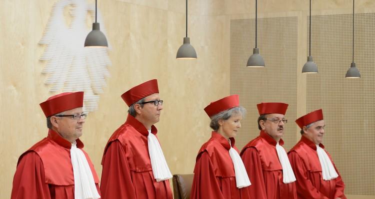 <a><img class="size-large wp-image-1781998" title="Constitutional Court ESM Germany European Stability Mechanism," src="https://www.theepochtimes.com/assets/uploads/2015/09/151846268.jpg" alt="The judges of Germany's Constitutional Court arrive to give their verdict on Germany's ratification of the European Stability Mechanism (ESM) on Sept. 12, in Karlsruhe, Germany. The court ruled that the measure does not run contrary to Germany's Constitution and added regulatory requirements to this decision. (Matthias Hangst/Getty Images) " width="590" height="314"/></a>