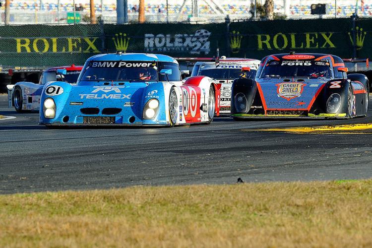 <a><img src="https://www.theepochtimes.com/assets/uploads/2015/09/1Prooit108606090.jpg" alt="Scott Pruett in the #01 Telmex Ganssi Riley BMW has more fuel than his competition, but he is behind them on the track. (John Harrelson/Getty Images)" title="Scott Pruett in the #01 Telmex Ganssi Riley BMW has more fuel than his competition, but he is behind them on the track. (John Harrelson/Getty Images)" width="320" class="size-medium wp-image-1809031"/></a>