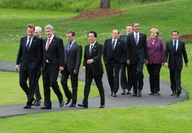 <a><img src="https://www.theepochtimes.com/assets/uploads/2015/09/20100626-G8-PMO-XXXXX.jpg" alt="Prime Minister of Canada Stephen Harper (second from left) is flanked by G8 leaders as they stroll down a path on their way to pose for a group photo at the G8 Summit in Huntsville, Ontario, Canada, on Friday, June 25, 2010. From the left are are Prime Minister of United Kingdom David Cameron, European Council President Herman Van Rompuy, President of Russia Dimtry Medvedev, President of Italy Silvio Berlusconi, United States President Barack Obama, President of Russia Dimtry Medvedev, German Chancellor Anglea Merkel, Prime Minister of Japan Naoto Kan, and President of France Nicolas Sarkozy. (G-8/G-20 Host Photo/Fred Chartrand)" title="Prime Minister of Canada Stephen Harper (second from left) is flanked by G8 leaders as they stroll down a path on their way to pose for a group photo at the G8 Summit in Huntsville, Ontario, Canada, on Friday, June 25, 2010. From the left are are Prime Minister of United Kingdom David Cameron, European Council President Herman Van Rompuy, President of Russia Dimtry Medvedev, President of Italy Silvio Berlusconi, United States President Barack Obama, President of Russia Dimtry Medvedev, German Chancellor Anglea Merkel, Prime Minister of Japan Naoto Kan, and President of France Nicolas Sarkozy. (G-8/G-20 Host Photo/Fred Chartrand)" width="320" class="size-medium wp-image-1818106"/></a>
