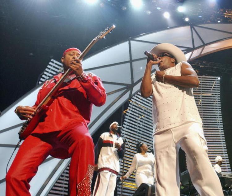 <a><img src="https://www.theepochtimes.com/assets/uploads/2015/09/2135761.jpg" alt="Robert Wilson, (L) and Charlie Wilson (R) of The Gap Band perform at the 2003 Essence Festival on July 3, 2003 in New Orleans, LO. (Chris Graythen/Getty Images)" title="Robert Wilson, (L) and Charlie Wilson (R) of The Gap Band perform at the 2003 Essence Festival on July 3, 2003 in New Orleans, LO. (Chris Graythen/Getty Images)" width="320" class="size-medium wp-image-1816047"/></a>