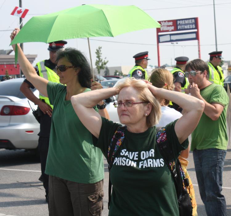 <a><img src="https://www.theepochtimes.com/assets/uploads/2015/09/4875876763_632876009f_b.jpg" alt="Police line up in the background as protesters gather to prevent the removal of 300 head of cattle from Frontenac Institution in Kingston on Aug. 9. The protesters claim Canada's six prison farms were closed to make way for U.S.-style privatization of t (Gord Campbell)" title="Police line up in the background as protesters gather to prevent the removal of 300 head of cattle from Frontenac Institution in Kingston on Aug. 9. The protesters claim Canada's six prison farms were closed to make way for U.S.-style privatization of t (Gord Campbell)" width="320" class="size-medium wp-image-1815919"/></a>