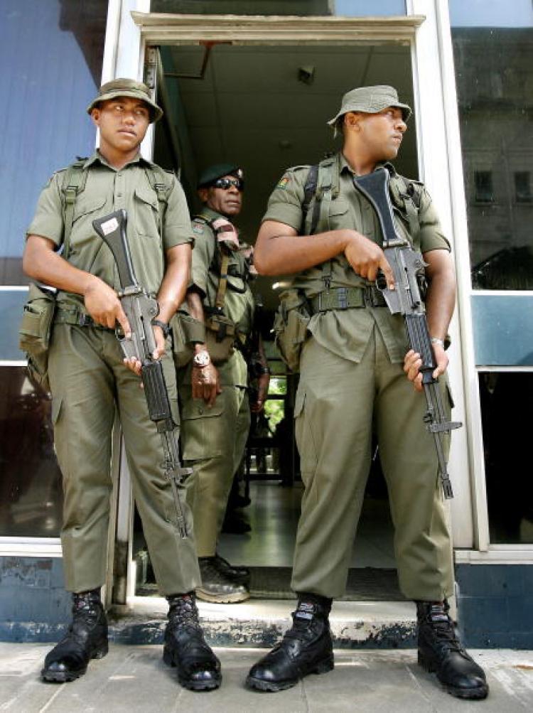 <a><img src="https://www.theepochtimes.com/assets/uploads/2015/09/72770419.jpg" alt="While Commodore Bainimarama maintains control of the judiciary and the media, there are already signs of internal struggle as members of the military compete for positions of power. (William West/AFP/Getty Images)" title="While Commodore Bainimarama maintains control of the judiciary and the media, there are already signs of internal struggle as members of the military compete for positions of power. (William West/AFP/Getty Images)" width="320" class="size-medium wp-image-1828395"/></a>