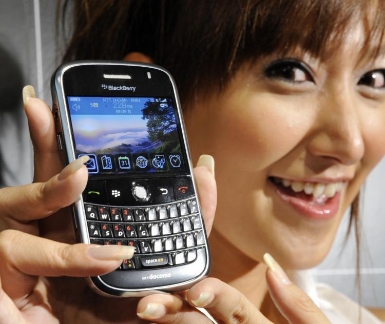 <a><img src="https://www.theepochtimes.com/assets/uploads/2015/09/83044230.jpg" alt="A model displays Canadian electronics maker Research In Motion's BlackBerry Bold smart phone in Tokyo. The new BlackBerry which can use high-speed 3G and IEEEa/b/g wireless LAN network will be launched in Japan early 2009. (YOSHIKAZU TSUNO/AFP/Getty Images)" title="A model displays Canadian electronics maker Research In Motion's BlackBerry Bold smart phone in Tokyo. The new BlackBerry which can use high-speed 3G and IEEEa/b/g wireless LAN network will be launched in Japan early 2009. (YOSHIKAZU TSUNO/AFP/Getty Images)" width="320" class="size-medium wp-image-1833604"/></a>