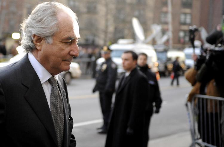 <a><img src="https://www.theepochtimes.com/assets/uploads/2015/09/85393034.jpg" alt="FRAUDSTER: In this file photo dated March 2009, Bernard Madoff is seen at a federal court in Manhattan in New York City. (Stephen Chernin/Getty Images)" title="FRAUDSTER: In this file photo dated March 2009, Bernard Madoff is seen at a federal court in Manhattan in New York City. (Stephen Chernin/Getty Images)" width="320" class="size-medium wp-image-1809702"/></a>