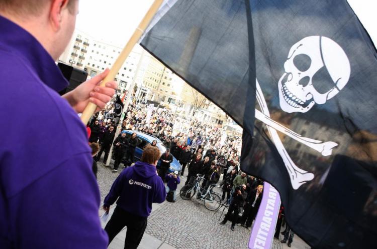 <a><img src="https://www.theepochtimes.com/assets/uploads/2015/09/86025831.jpg" alt="FILE SHARERS BEWARE: File photo taken on April 18, 2009 shows supporters of the Pirate Bay website, one of the world's top illegal file sharing websites, demonstrating in Stockholm. (Fredrik Persson/Getty Images )" title="FILE SHARERS BEWARE: File photo taken on April 18, 2009 shows supporters of the Pirate Bay website, one of the world's top illegal file sharing websites, demonstrating in Stockholm. (Fredrik Persson/Getty Images )" width="320" class="size-medium wp-image-1807608"/></a>