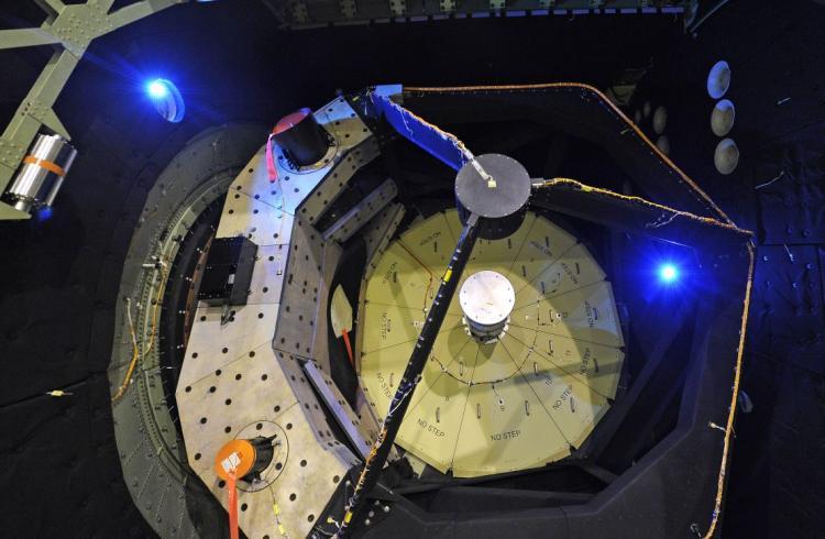 <a><img src="https://www.theepochtimes.com/assets/uploads/2015/09/98629228.jpg" alt="The primary telescope mirror, seen under yellow protective panels inside the open telescope bay is shown at the first public viewing of the Stratospheric Observatory for Infrared Astronomy (SOFIA), a cooperative venture between NASA and German scientists on April 20, 2010. (Robyn Beck/AFP/Getty Images)" title="The primary telescope mirror, seen under yellow protective panels inside the open telescope bay is shown at the first public viewing of the Stratospheric Observatory for Infrared Astronomy (SOFIA), a cooperative venture between NASA and German scientists on April 20, 2010. (Robyn Beck/AFP/Getty Images)" width="320" class="size-medium wp-image-1817844"/></a>