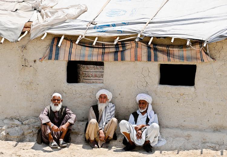 <a><img src="https://www.theepochtimes.com/assets/uploads/2015/09/AFGHANISTAN-WEB.jpg" alt="WAR CONTINUES: Elderly Afghan men sit outside mud shelters for the displaced in Kabul on July 7. (Shah Mari/Getty Images)" title="WAR CONTINUES: Elderly Afghan men sit outside mud shelters for the displaced in Kabul on July 7. (Shah Mari/Getty Images)" width="320" class="size-medium wp-image-1817488"/></a>