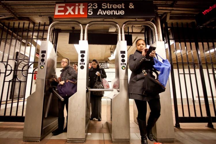 <a><img class="size-large wp-image-1772910" title="Amal+Chen-20111214-IMG_4924- Commuters at the 23rd Street and Fifth Avenue station pass through turnstiles last winter. (Amal Chen/The Epoch Times) " src="https://www.theepochtimes.com/assets/uploads/2015/09/Amal+Chen-20111214-IMG_4924.jpg" alt=" Commuters at the 23rd Street and Fifth Avenue station pass through turnstiles last winter. (Amal Chen/The Epoch Times) " width="590" height="393"/></a>