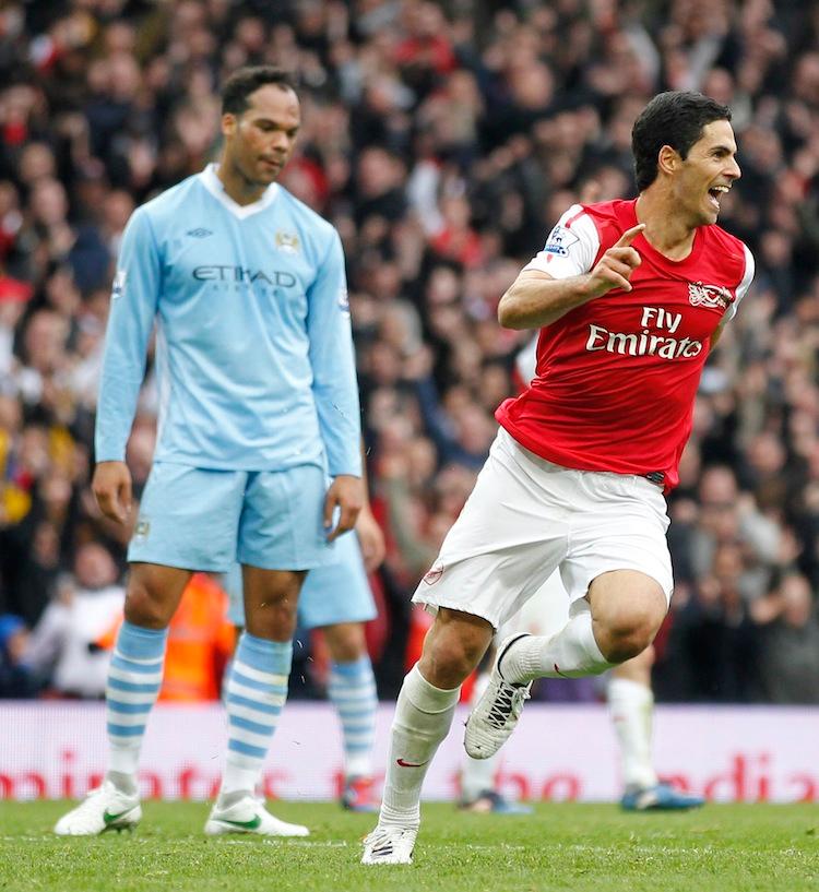 <a><img class="size-large wp-image-1789474" title="Arsenal's Spanish player Mikel Arteta ce" src="https://www.theepochtimes.com/assets/uploads/2015/09/Arteta142586359_web.jpg" alt="Arsenal's Mikel Arteta celebrates his winning goal as Manchester City's Joleon Lescott looks on glumly. (Ian Kington/AFP/Getty Images) " width="541" height="590"/></a>