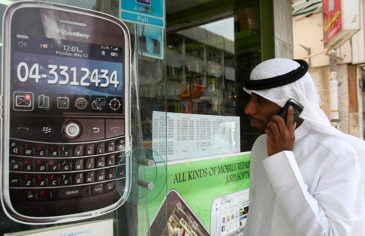 <a><img src="https://www.theepochtimes.com/assets/uploads/2015/09/BB103186621.jpg" alt="A man walks past a sign advertising the BlackBerry mobile phone at a shopping mall in Dubai on August 01. As the Gulf business hub stated it will suspend key BlackBerry services from October because they are incompatible with local laws and raise security issues. (STR/Getty Images)" title="A man walks past a sign advertising the BlackBerry mobile phone at a shopping mall in Dubai on August 01. As the Gulf business hub stated it will suspend key BlackBerry services from October because they are incompatible with local laws and raise security issues. (STR/Getty Images)" width="320" class="size-medium wp-image-1816411"/></a>
