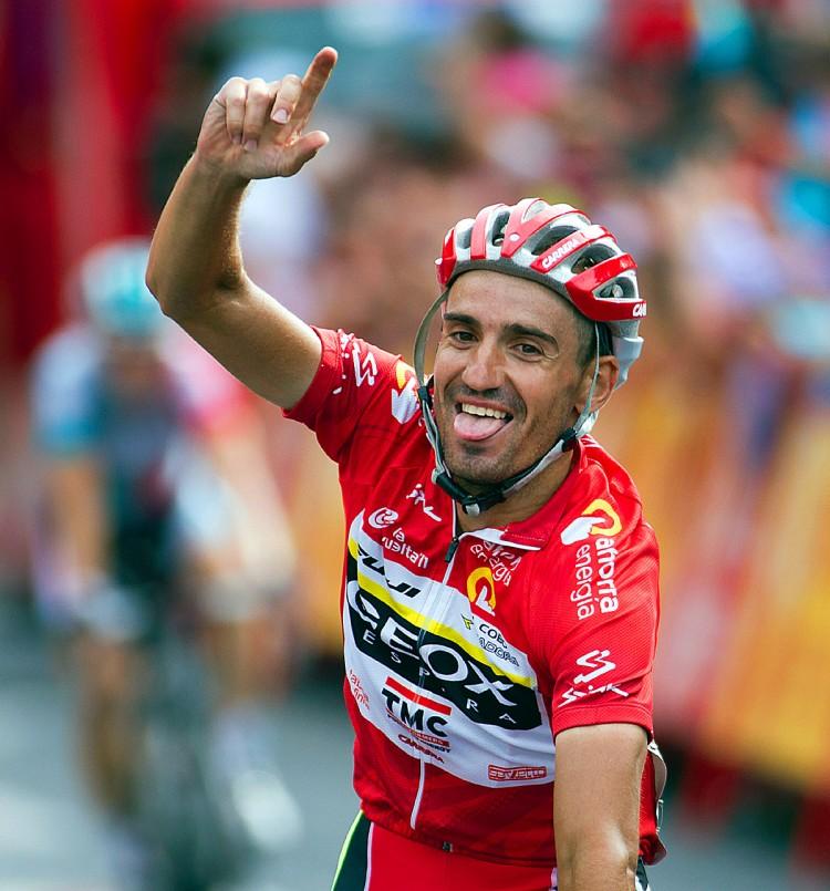 <a><img class="size-medium wp-image-1797973" title="Juan Jose Cobo of Geox TMC celebrates winning the 2011 Vuelta a España. (Jaime Reina/AFP/Getty Images)" src="https://www.theepochtimes.com/assets/uploads/2015/09/CoboVuelta124655502WEB.jpg" alt="Juan Jose Cobo of Geox TMC celebrates winning the 2011 Vuelta a España. (Jaime Reina/AFP/Getty Images)" width="575"/></a>