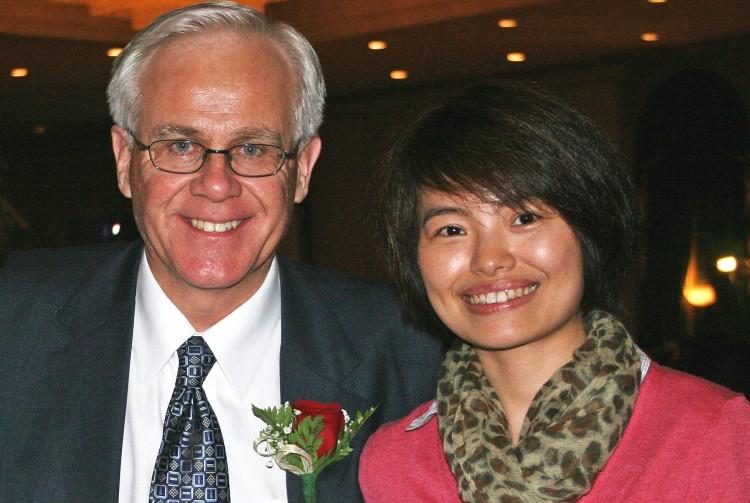 MP Bob Dechert and Xinhua reporter Shi Rong in an undated photo sent to government and media contacts from Shi's email account last week.