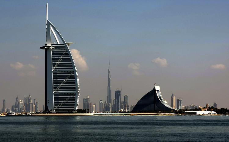 <a><img src="https://www.theepochtimes.com/assets/uploads/2015/09/Dubai95003137.jpg" alt="Dubai's three most prominent architectural icons, Burj an-Arab Hotel (L), Jumirah Hotel (R) and Burj Dubai (C), are seen along the coast of Dubai. (Marwan Naamani/Getty Images )" title="Dubai's three most prominent architectural icons, Burj an-Arab Hotel (L), Jumirah Hotel (R) and Burj Dubai (C), are seen along the coast of Dubai. (Marwan Naamani/Getty Images )" width="320" class="size-medium wp-image-1817220"/></a>