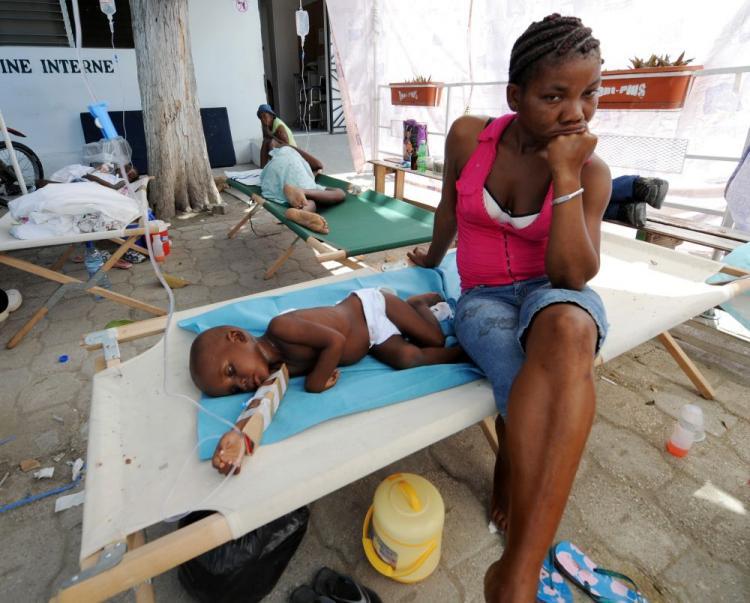 <a><img src="https://www.theepochtimes.com/assets/uploads/2015/09/Haiti-105995595b.jpg" alt="Sick patients and their families wait at the St. Nicolas Hospital in St. Marc, north of Port-au-Prince on Oct. 24. Haiti's cholera crisis deepened Sunday as the first cases of cholera in the capital raised fears that an epidemic could infiltrate Port-au-Prince's squalid tent cities and spawn a major health disaster. (Thony Belizaire/AFP/Getty Images)" title="Sick patients and their families wait at the St. Nicolas Hospital in St. Marc, north of Port-au-Prince on Oct. 24. Haiti's cholera crisis deepened Sunday as the first cases of cholera in the capital raised fears that an epidemic could infiltrate Port-au-Prince's squalid tent cities and spawn a major health disaster. (Thony Belizaire/AFP/Getty Images)" width="320" class="size-medium wp-image-1813128"/></a>