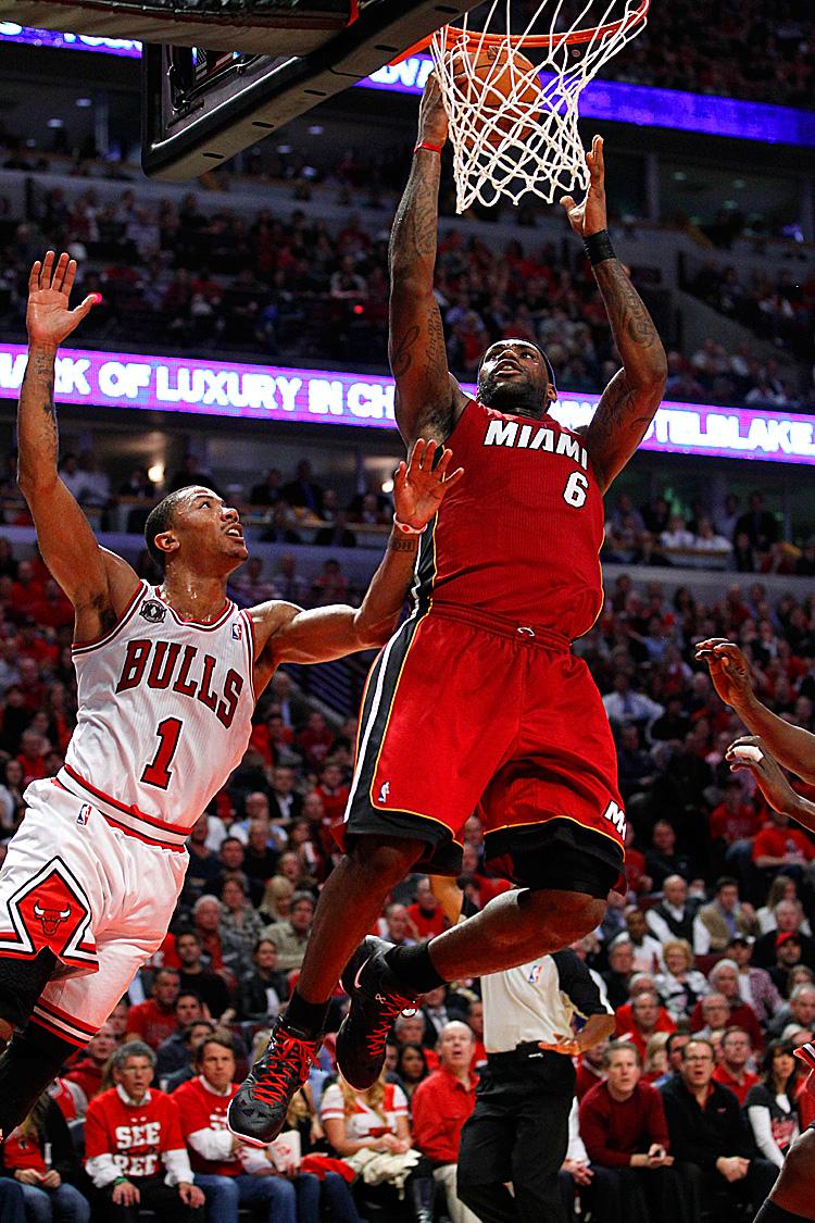 <a><img class="size-large wp-image-1794840" title="Miami Heat v Chicago Bulls - Game Two" src="https://www.theepochtimes.com/assets/uploads/2015/09/LebronJames114379997QWEB.jpg" alt="LeBron James (6) and the Heat look like they have just enough to get past Derrick Rose (1) and the Bulls. (Gregory Shamus/Getty Images)" width="393" height="590"/></a>