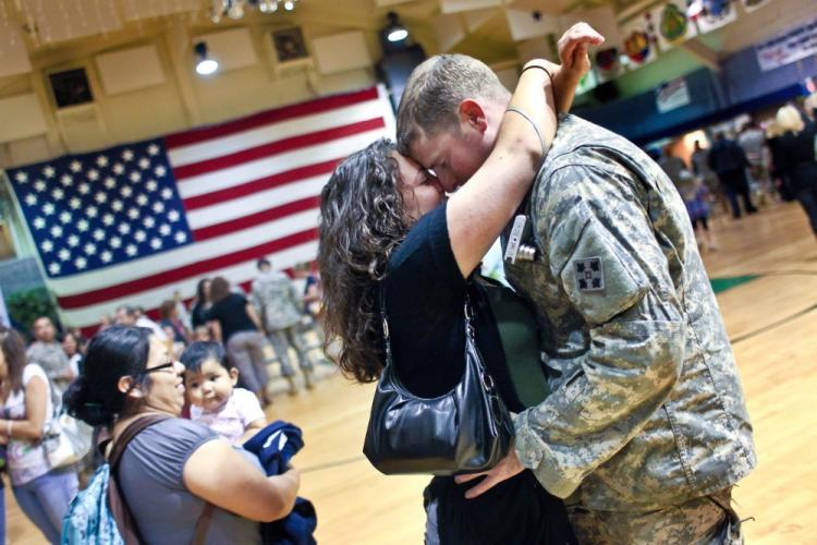 <a><img src="https://www.theepochtimes.com/assets/uploads/2015/09/McCulloch103567326.jpg" alt="U.S. Army Spc. Tim McCulloch embraces his girlfriend Deanna Meder after arriving home from Iraq on Aug. 23 to Fort Carson, Colo. McCullouch, from the 4th Infantry, is among the many U.S. soldiers returning home from Iraq, as Operation Iraqi Freedom draws to a close. (John Moore/Getty Images)" title="U.S. Army Spc. Tim McCulloch embraces his girlfriend Deanna Meder after arriving home from Iraq on Aug. 23 to Fort Carson, Colo. McCullouch, from the 4th Infantry, is among the many U.S. soldiers returning home from Iraq, as Operation Iraqi Freedom draws to a close. (John Moore/Getty Images)" width="320" class="size-medium wp-image-1815652"/></a>