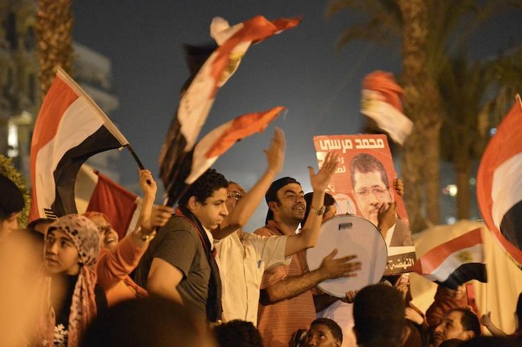 <a><img class="size-full wp-image-1785746" title="Egyptians celebrate Muslim Brotherhood candidate Mohamed Mursi's victory in Egypt's presidential elections in Cairo's Tahrir Square on June 24. (Khaled Desouki/AFP/GettyImages)" src="https://www.theepochtimes.com/assets/uploads/2015/09/Mursi146981564.jpg" alt="" width="750" height="499"/></a>