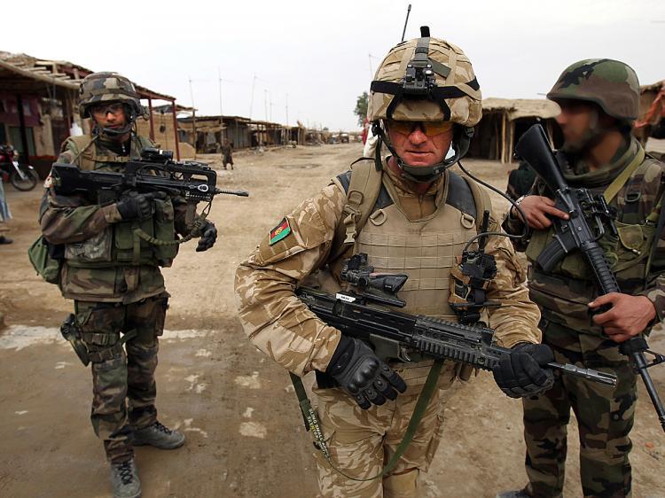 <a><img src="https://www.theepochtimes.com/assets/uploads/2015/09/NATO97046458.jpg" alt="NATO TROOPS: A British soldier (C) of the 1st batallion of the Royal Welsh patrols jointly with French soldiers of the 21st RIMA in the streets of Showal in Nad-e-Ali district, Southern Afghanistan, in Helmand Province. (Thomas Coex/AFP/Getty Images)" title="NATO TROOPS: A British soldier (C) of the 1st batallion of the Royal Welsh patrols jointly with French soldiers of the 21st RIMA in the streets of Showal in Nad-e-Ali district, Southern Afghanistan, in Helmand Province. (Thomas Coex/AFP/Getty Images)" width="320" class="size-medium wp-image-1815072"/></a>
