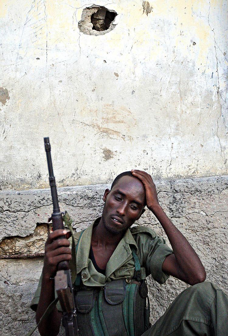 <a><img src="https://www.theepochtimes.com/assets/uploads/2015/09/SOMALIA.jpg" alt="TOUGH STATE: A government soldier takes a rest after a shootout with hard-line Islamic fighters in Mogadishu, Somalia, last year. The annual Failed States Index announced on Monday that Somalia tops the list for a third consecutive year. (Mohamed Dahir/AFP/Getty Images)" title="TOUGH STATE: A government soldier takes a rest after a shootout with hard-line Islamic fighters in Mogadishu, Somalia, last year. The annual Failed States Index announced on Monday that Somalia tops the list for a third consecutive year. (Mohamed Dahir/AFP/Getty Images)" width="320" class="size-medium wp-image-1818319"/></a>