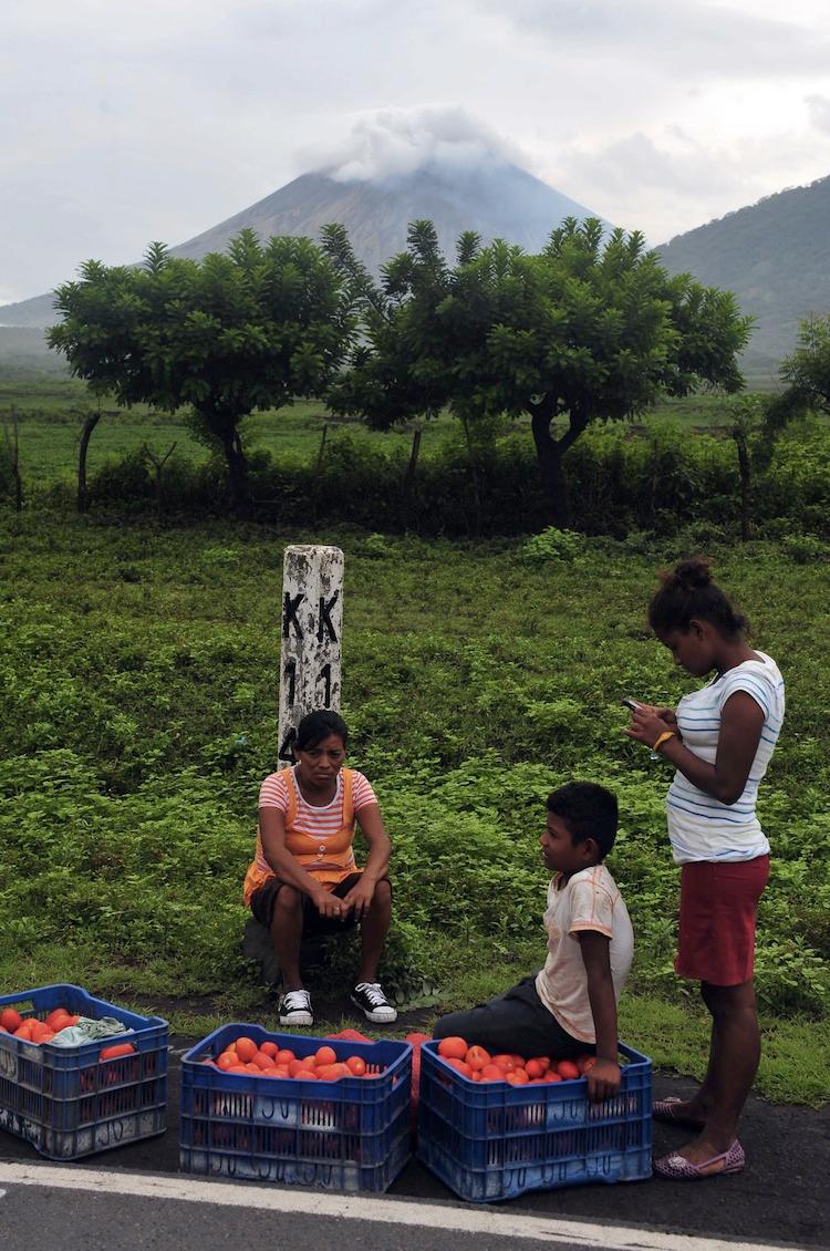<a><img class=" wp-image-1782210" title="Backdropped by the San Cristobal volcano, people wait for transportation along the Pan American Highway in Chinandega, Chonco sector, Nicaragua, on Sept. 9. On Saturday it rumbled to life with three explosions prompting a column of smoke and ash to rise from its cone and forcing the evacuation of 3,000 residents living on or around its slopes. (Hector Retamal/AFP/GettyImages)" src="https://www.theepochtimes.com/assets/uploads/2015/09/San-Cristobal151638601.jpg" alt="" width="326" height="491"/></a>