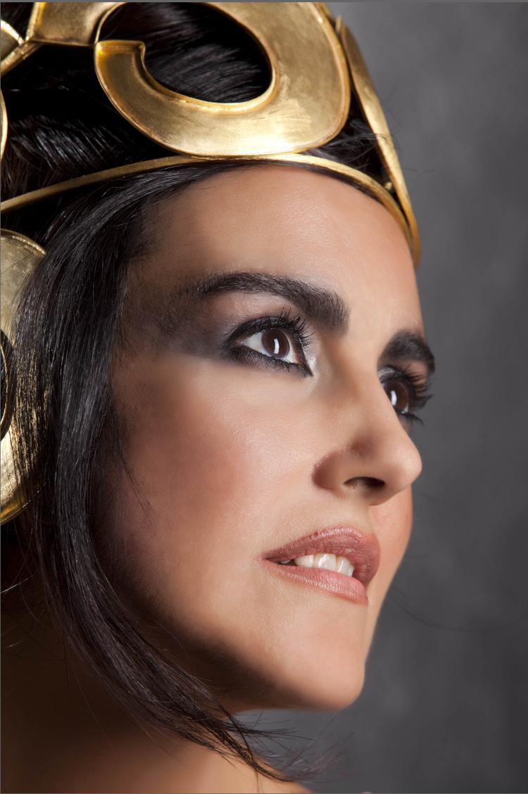 <a><img src="https://www.theepochtimes.com/assets/uploads/2015/09/Vasilik111.jpg" alt="Artist Vassiliki Theodorakidi models one of her creations. (Courtesy of Thyreos))" title="Artist Vassiliki Theodorakidi models one of her creations. (Courtesy of Thyreos))" width="320" class="size-medium wp-image-1826205"/></a>