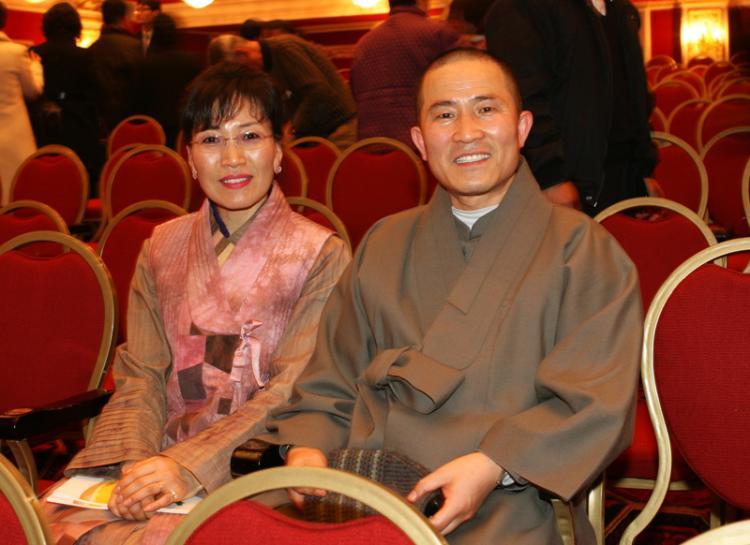 <a><img src="https://www.theepochtimes.com/assets/uploads/2015/09/abbot.jpg" alt="Abbot Eung-Cheon (R) of Seoul Land Temple next to another audience member at the Divine Performing Arts show. (Jin-Tae Kim/The Epoch Times)" title="Abbot Eung-Cheon (R) of Seoul Land Temple next to another audience member at the Divine Performing Arts show. (Jin-Tae Kim/The Epoch Times)" width="320" class="size-medium wp-image-1830299"/></a>