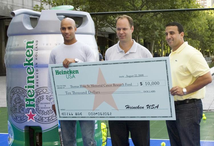<a><img src="https://www.theepochtimes.com/assets/uploads/2015/09/blake.jpg" alt="MONEY SERVE: James Blake (left) received a $10,000 donation to his Cancer Research Fund from Heineken CMO, Christian McMahan (center) and Sr. Brand Director, Brian Citron (right). (Helena Zhu The Epoch Times)" title="MONEY SERVE: James Blake (left) received a $10,000 donation to his Cancer Research Fund from Heineken CMO, Christian McMahan (center) and Sr. Brand Director, Brian Citron (right). (Helena Zhu The Epoch Times)" width="320" class="size-medium wp-image-1833988"/></a>