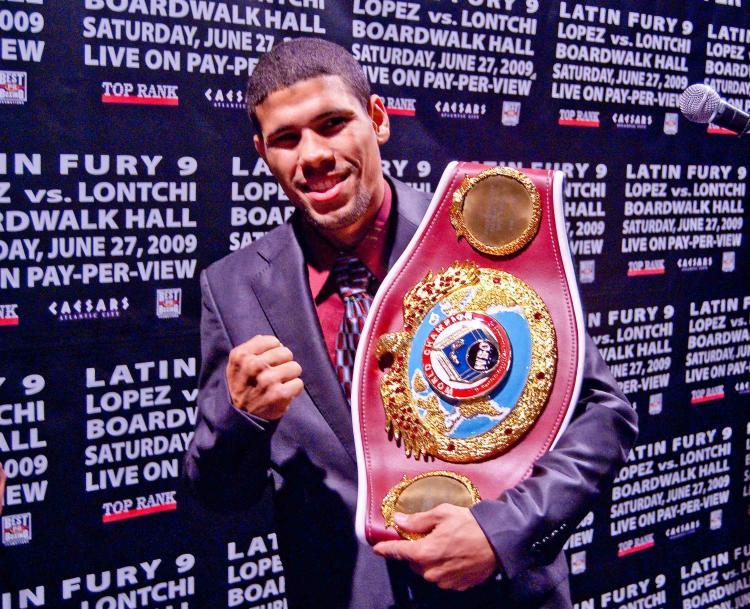 <a><img src="https://www.theepochtimes.com/assets/uploads/2015/09/boxing.jpg" alt="CONTESTED: Juan Manuel �Juanma� Lopez holds his junior featherweight champion belt. (Joshua Philipp/The Epoch Times)" title="CONTESTED: Juan Manuel �Juanma� Lopez holds his junior featherweight champion belt. (Joshua Philipp/The Epoch Times)" width="320" class="size-medium wp-image-1827725"/></a>