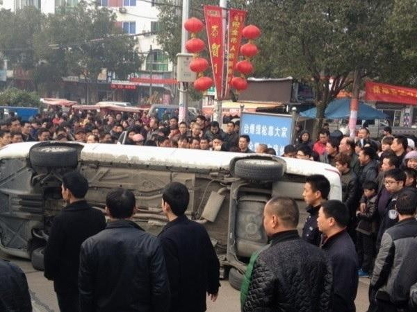 <a><img class="size-medium wp-image-1768372" src="https://www.theepochtimes.com/assets/uploads/2015/09/chengguan.jpg" alt="" width="350" height="262"/></a>