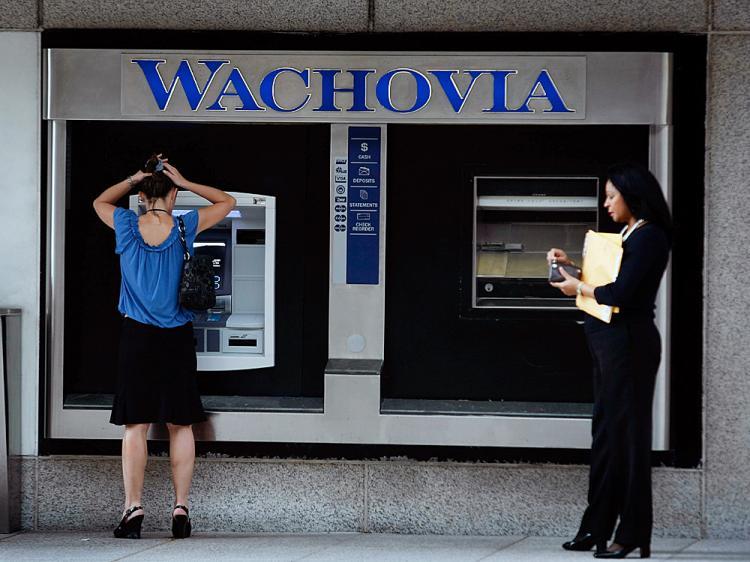 <a><img src="https://www.theepochtimes.com/assets/uploads/2015/09/cigarette83050650.jpg" alt="People use an ATM at a Wachovia bank branch September 29, 2008 in Miami, Florida. (Joe Raedle/Getty Images)" title="People use an ATM at a Wachovia bank branch September 29, 2008 in Miami, Florida. (Joe Raedle/Getty Images)" width="320" class="size-medium wp-image-1833584"/></a>