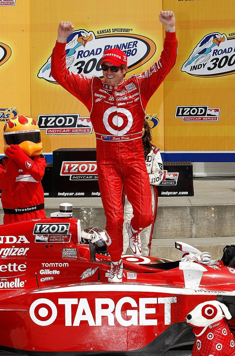 <a><img src="https://www.theepochtimes.com/assets/uploads/2015/09/dixon98784115.jpg" alt="Scott Dixon celebrates winning the Indy Car Series Road Runner Turbo Indy 300 at Kansas Speedway in Kansas City, Kansas. (Jonathan Ferrey/Getty Images)" title="Scott Dixon celebrates winning the Indy Car Series Road Runner Turbo Indy 300 at Kansas Speedway in Kansas City, Kansas. (Jonathan Ferrey/Getty Images)" width="320" class="size-medium wp-image-1820442"/></a>
