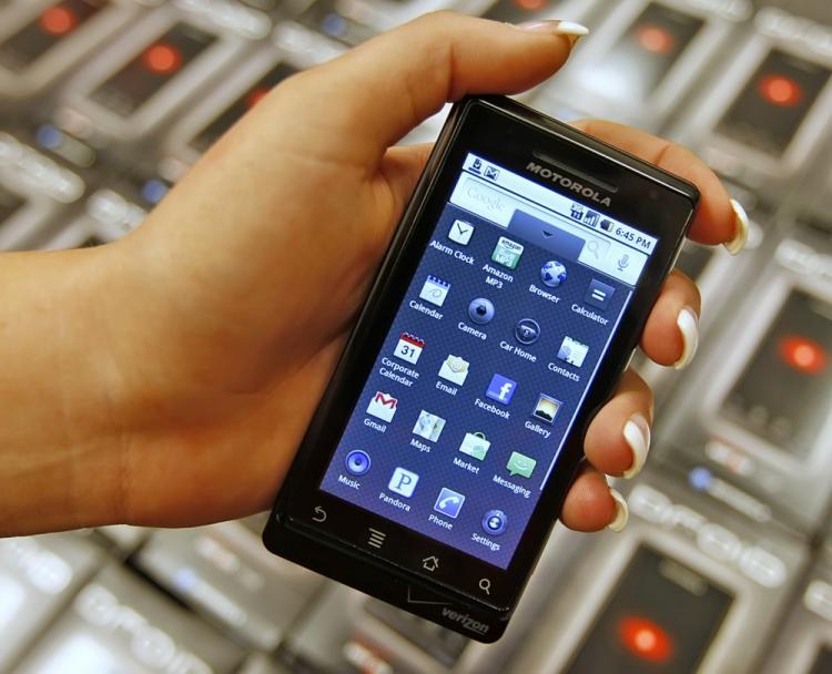 <a><img src="https://www.theepochtimes.com/assets/uploads/2015/09/droid92813328.jpg" alt="A Motorola Droid smart phone running Android. A new Android application, TaintDroid, can detect if apps are sending a user�s phone number or other data to outside sources. (George Frey/Getty Images)" title="A Motorola Droid smart phone running Android. A new Android application, TaintDroid, can detect if apps are sending a user�s phone number or other data to outside sources. (George Frey/Getty Images)" width="320" class="size-medium wp-image-1812927"/></a>