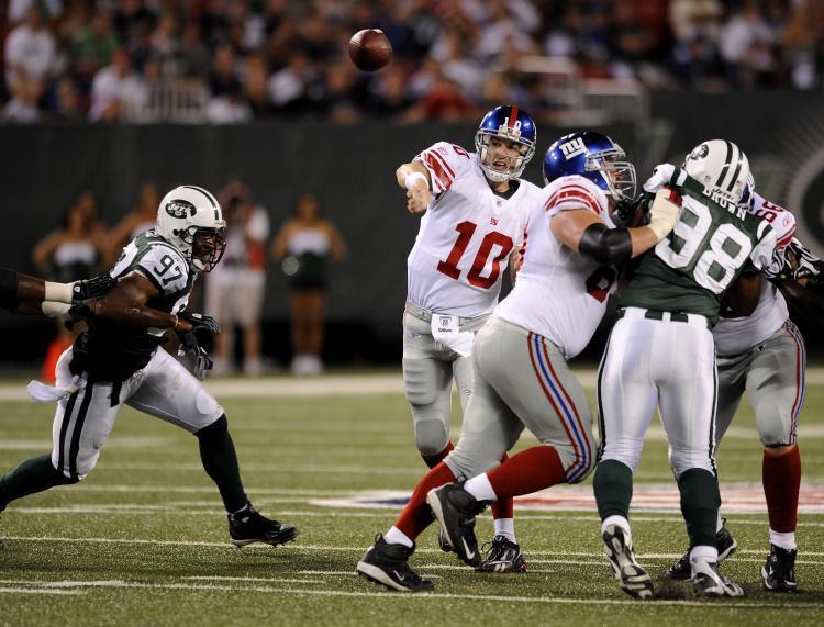 <a><img src="https://www.theepochtimes.com/assets/uploads/2015/09/giantsjets.jpg" alt="New York's two professional football teams meet in preseason action Saturday night. (Jeff Zelevansky/Getty Images)" title="New York's two professional football teams meet in preseason action Saturday night. (Jeff Zelevansky/Getty Images)" width="320" class="size-medium wp-image-1826552"/></a>