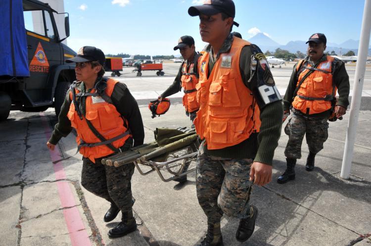 <a><img src="https://www.theepochtimes.com/assets/uploads/2015/09/guatemala_95811667.jpg" alt="Members of the Humanitarian and Rescue Unit (UHR) of the Guatemalan Army prepare to leave to Haiti, on January 13, 2010 in Guatemala City. Planeloads of rescuers and relief supplies headed to Haiti today. (Johan Ordonez/AFP/Getty Images)" title="Members of the Humanitarian and Rescue Unit (UHR) of the Guatemalan Army prepare to leave to Haiti, on January 13, 2010 in Guatemala City. Planeloads of rescuers and relief supplies headed to Haiti today. (Johan Ordonez/AFP/Getty Images)" width="320" class="size-medium wp-image-1823914"/></a>